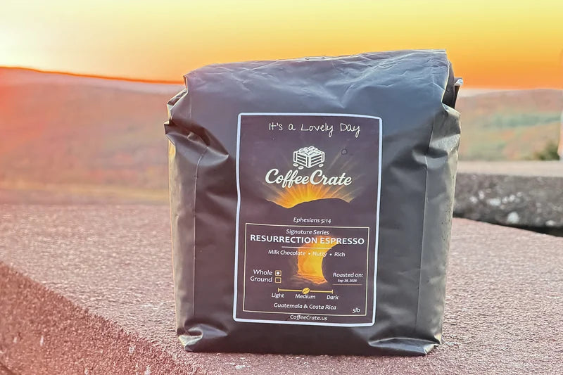 A bag of Resurrection Espresso in warm sunrise light.